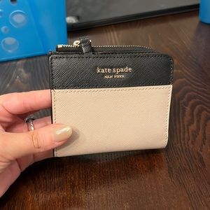 Small kate spade two tone wallet.